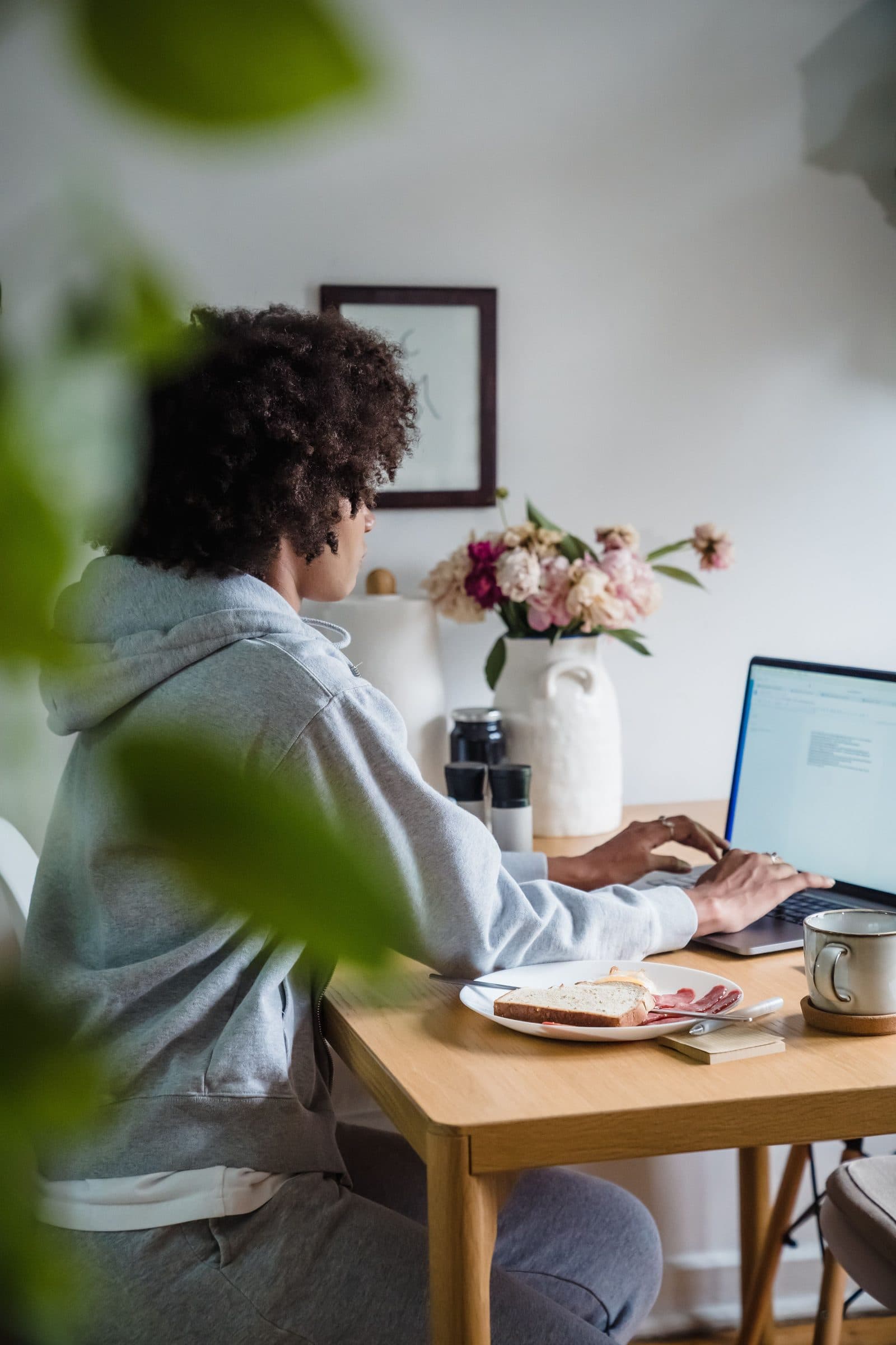 A host reviewing bookings on a laptop at their stay